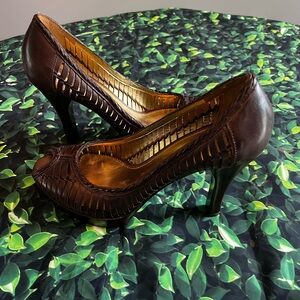 Guess by Marciano 4” brown leather heels with 1” platform, never worn.Size 9